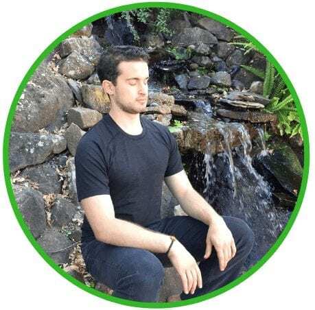 jared levenson meditating mindfully near a stream
