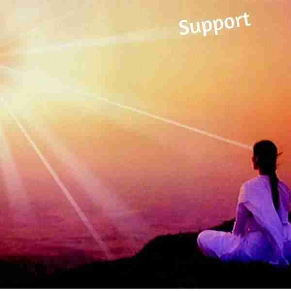 support group picture of woman meditating on the shoreline with sunset background