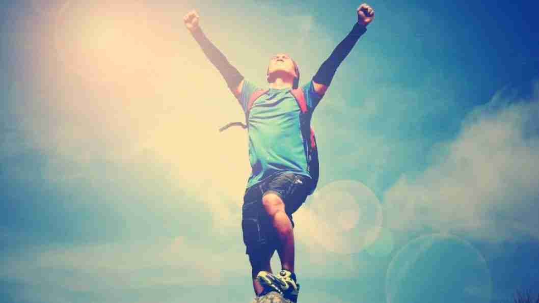 victory pose hands up in air